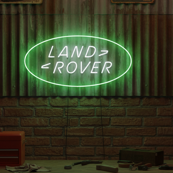 Green and white Land Rover oval logo neon sign, ideal for off-road and adventure enthusiasts.